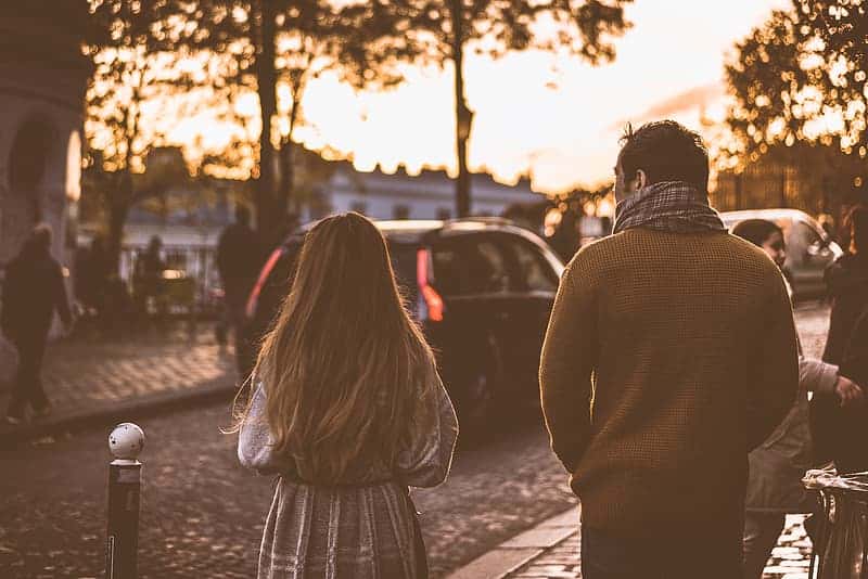 man-and-woman-standing-near-street