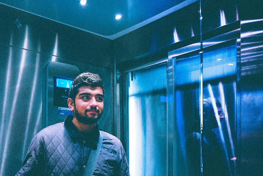 portrait-man-lift-indoors