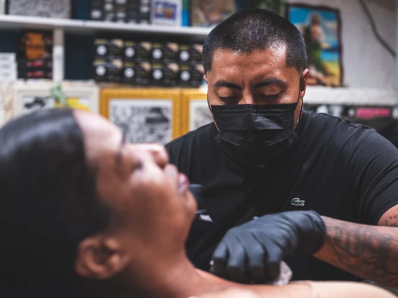 tattoo-artist-on-focus-photography-2940160