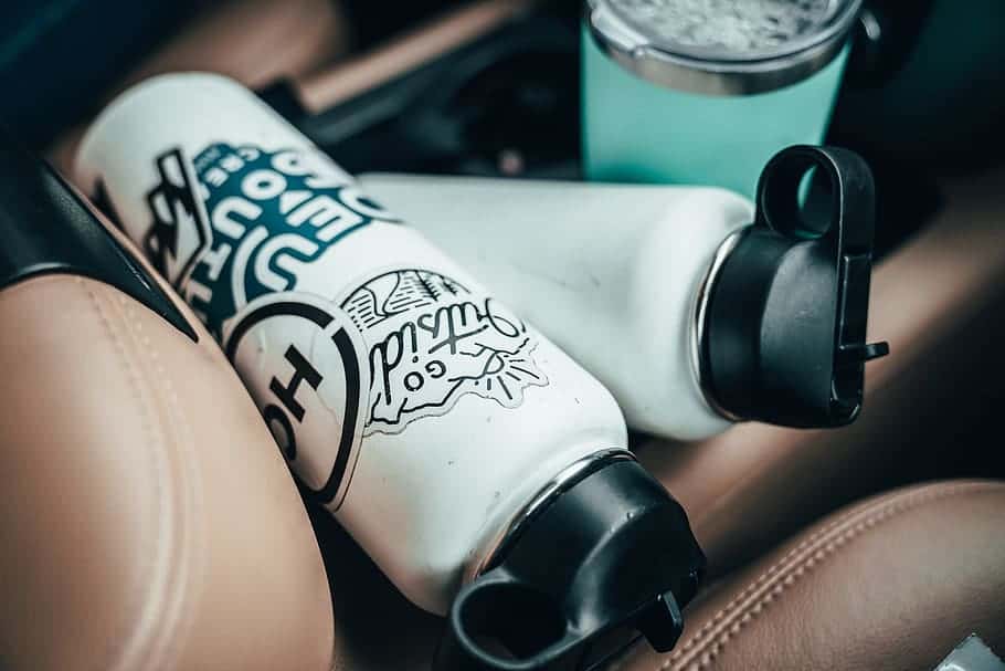 two-white-and-black-sports-bottle