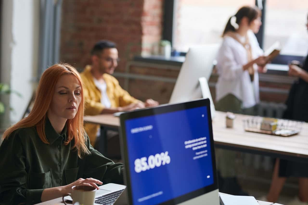 woman-seated-working-on-computer-3184640