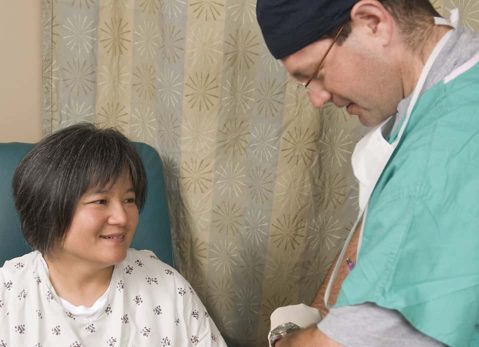 16391-a-female-patient-being-examined-by-her-doctor-pv