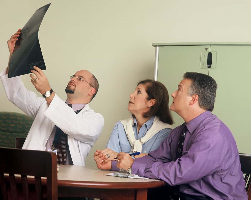 17331-a-doctor-and-couple-viewing-an-x-ray-pv