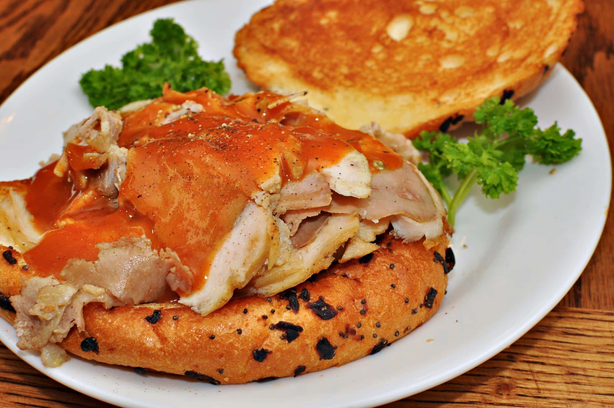 Mmm..._Leftover_turkey_roll_with_homemade_BBQ_sauce_on_an_onion_roll._(6427666895)
