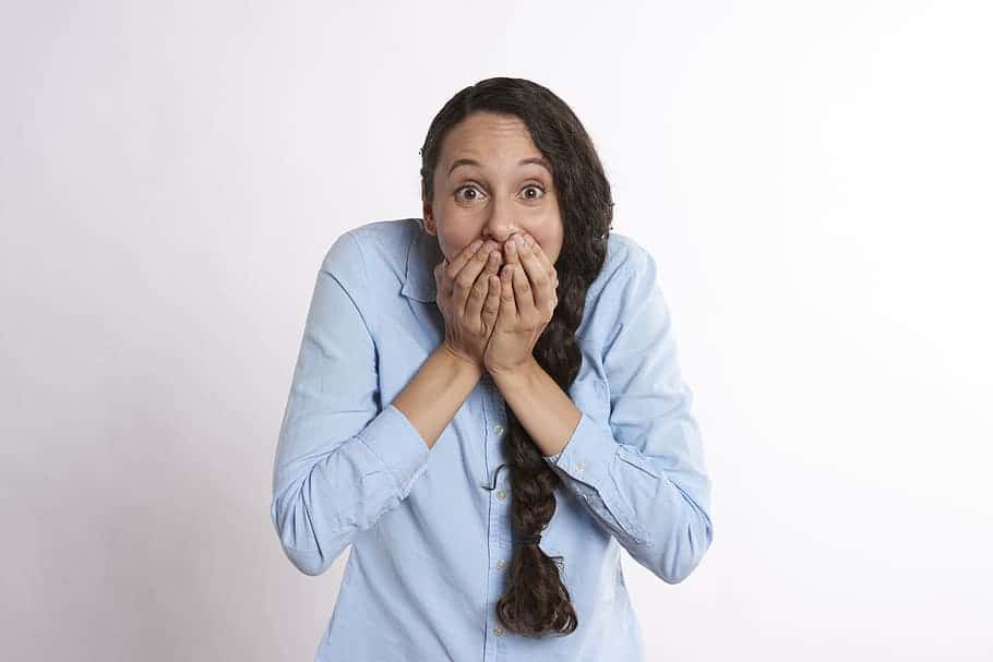 secret-mouth-covered-woman