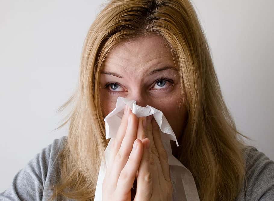 woman-blow-blowing-nose