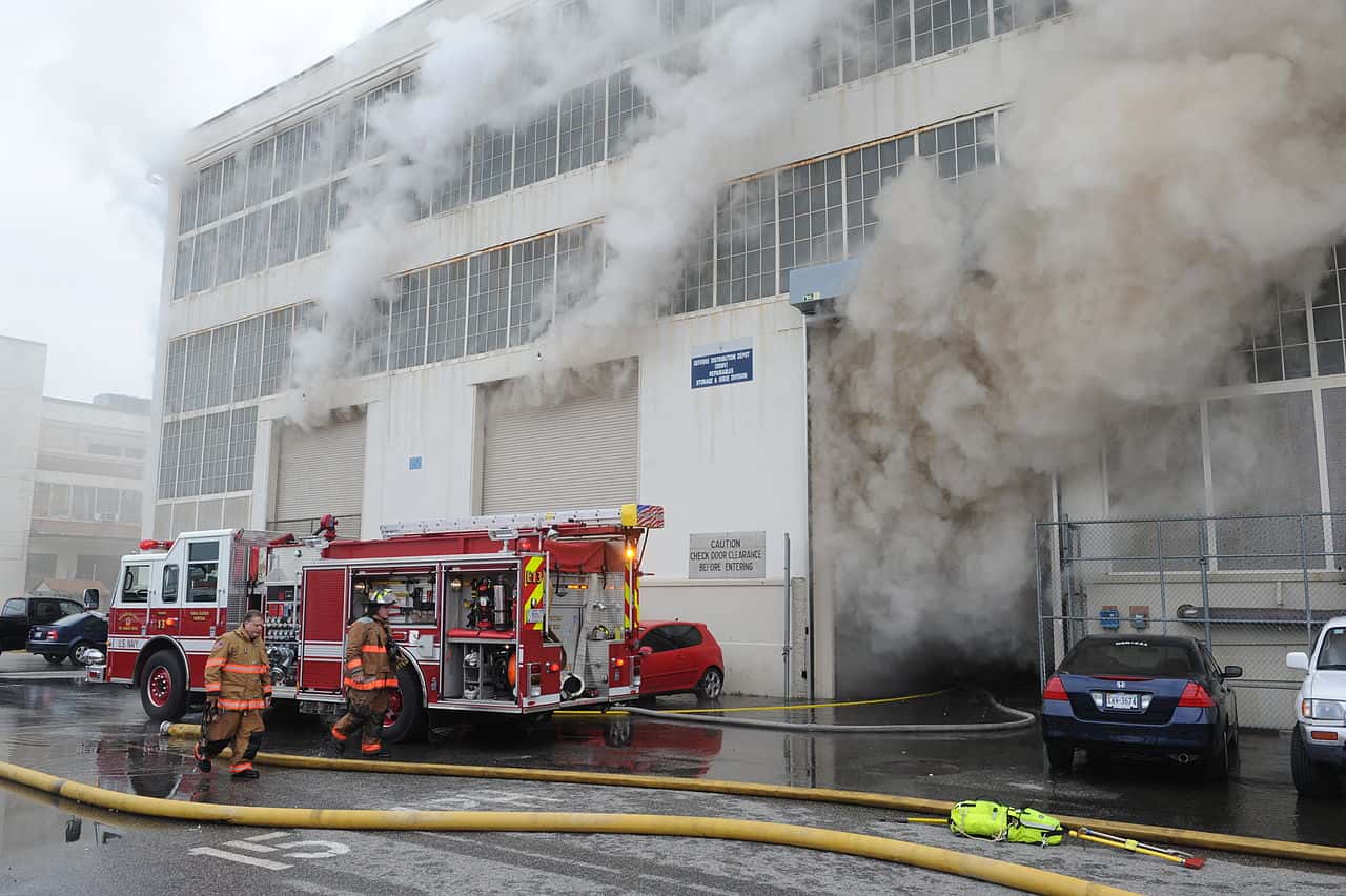 1280px-US_Navy_110127-N-3478R-101_Firefighters_extinguish_a_warehouse_fire_at_the_defense_distribution_depot_at_Naval_Station_Norfolk