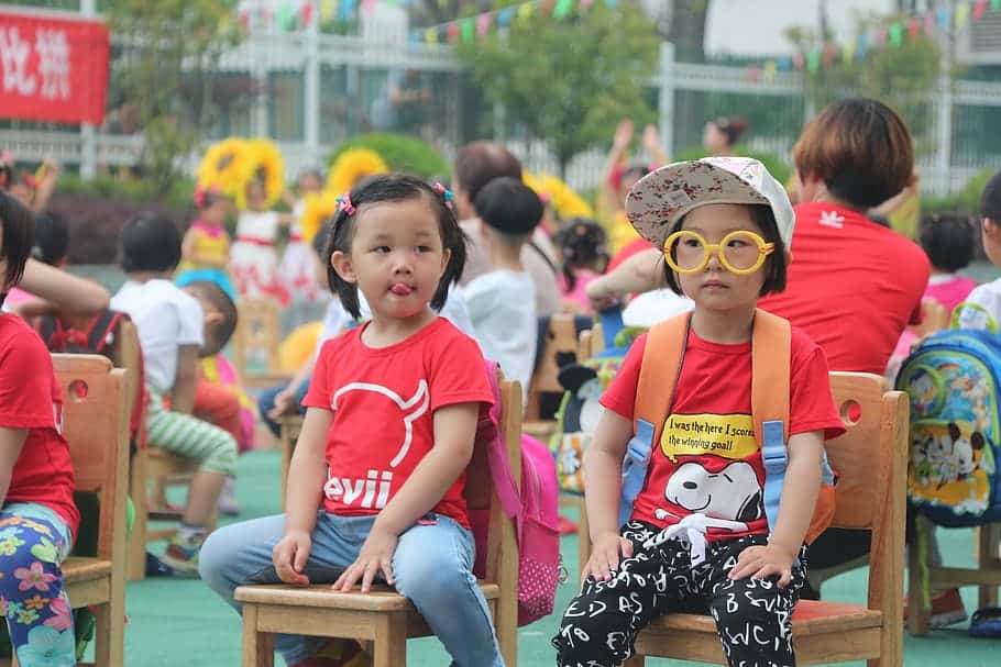 cute-children-activities-girls-sat-chair