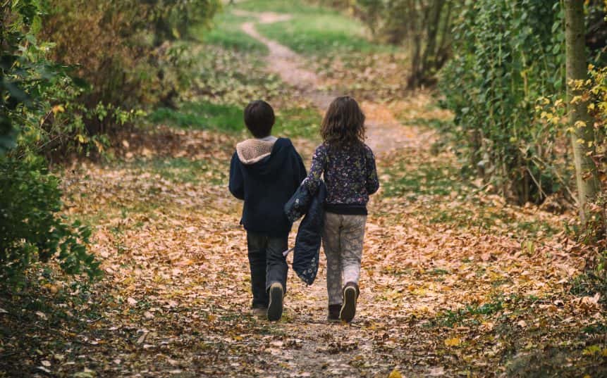little-boy-girl-walking-path-861x537