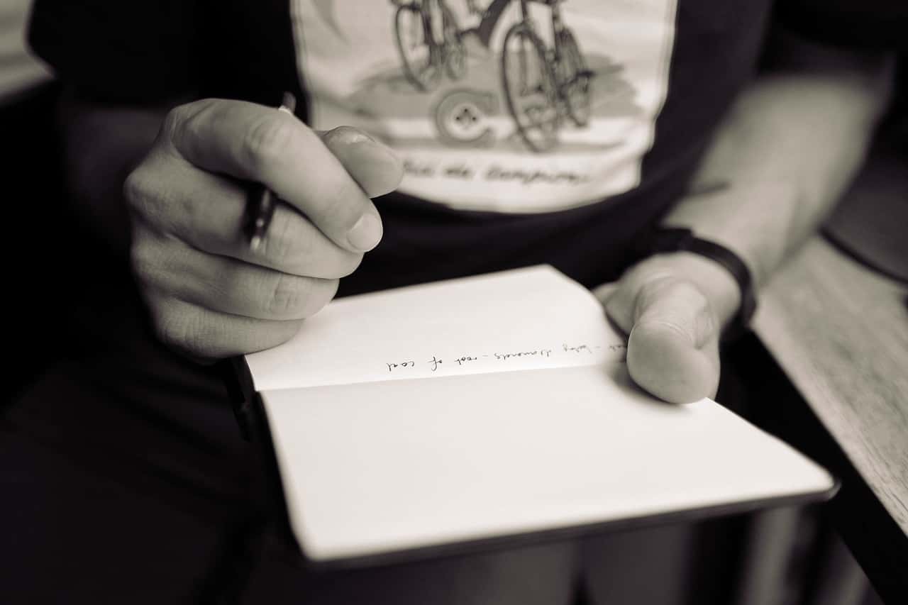 notebook-writing-hand-man-black-and-white-white-595653-pxhere.com