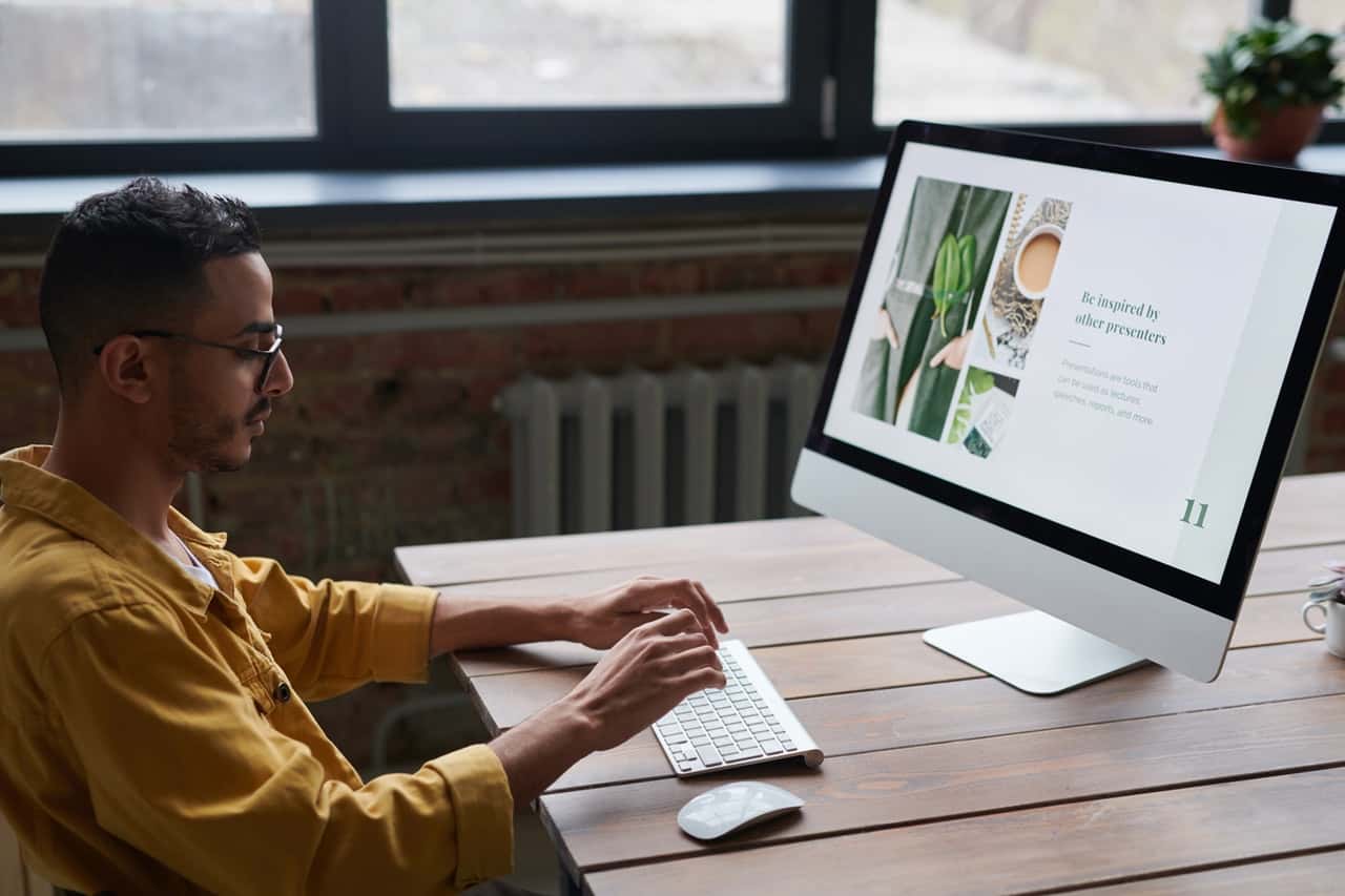 photo-of-man-using-computer-3184667