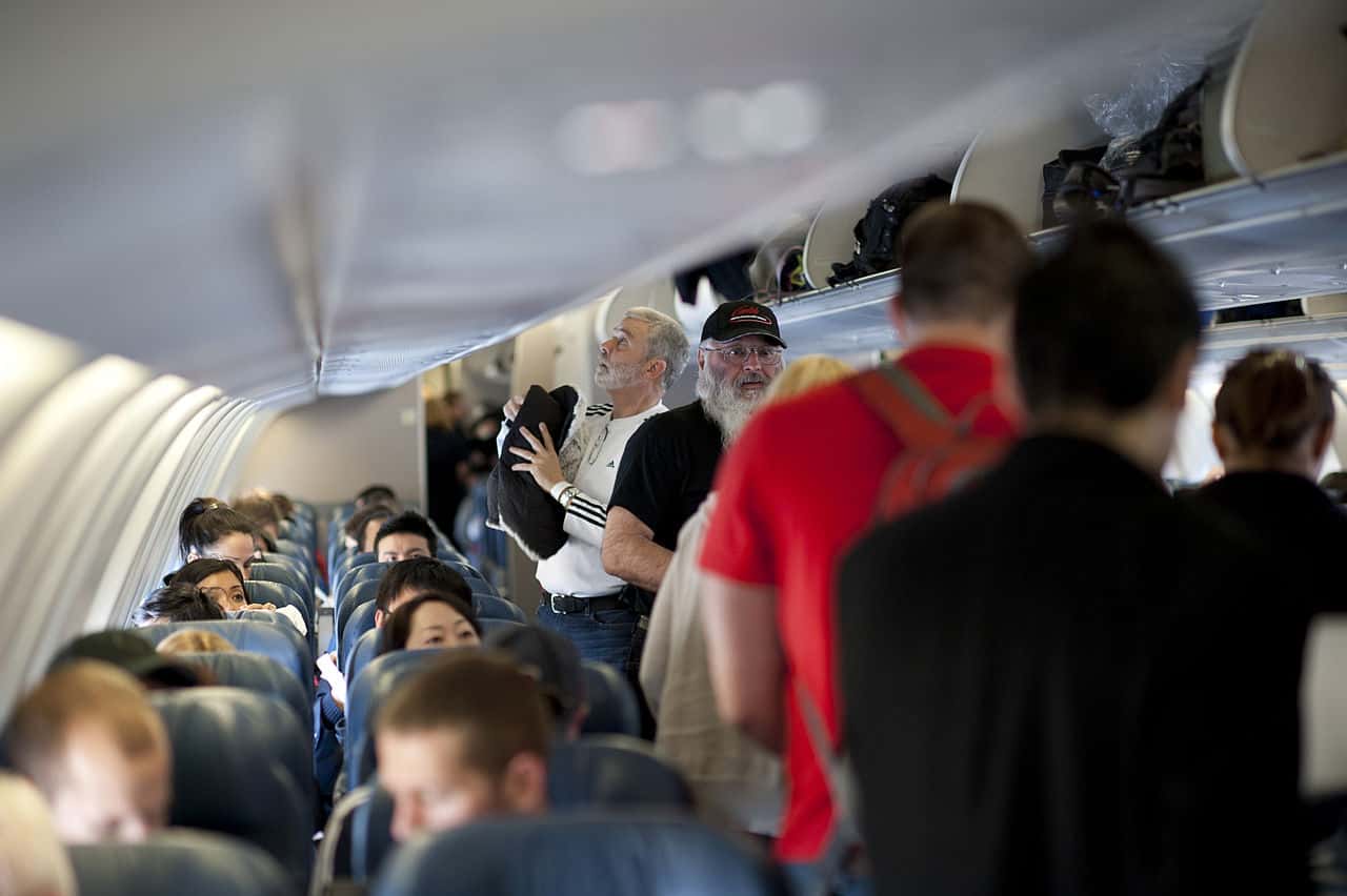 110312-F-NW653-129_Passengers_board_a_Delta_Air_Lines_aircraft