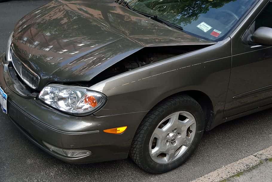 crashed-car-damage-dent-hood