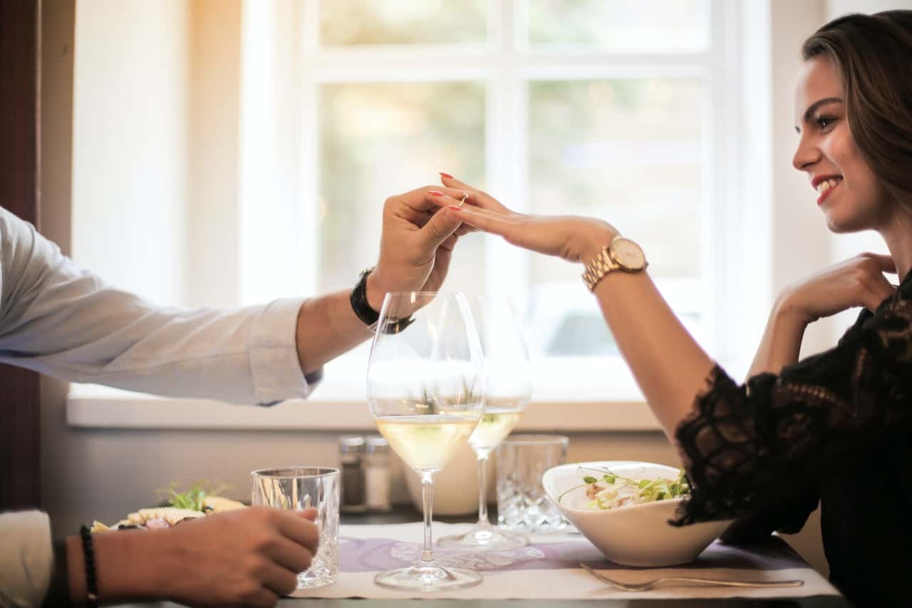 crop-man-making-proposal-in-luxurious-restaurant-during-3756353