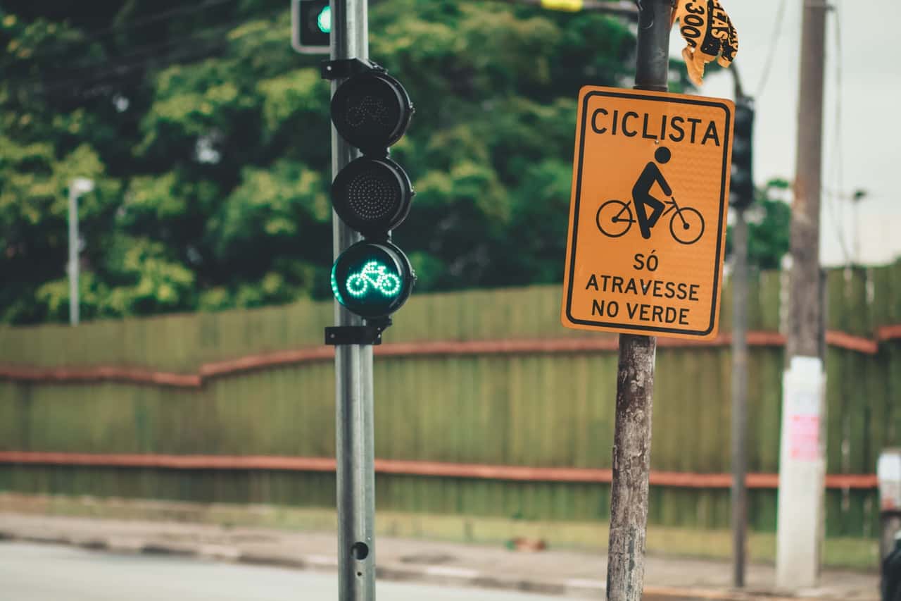 cyclist-sign-near-traffic-light-in-green-light-2174444