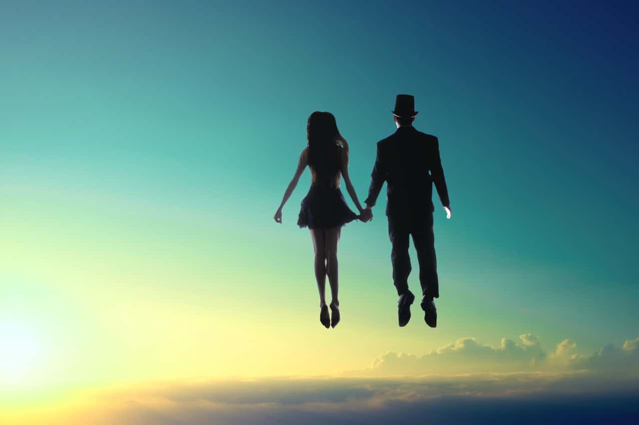man-and-woman-floating-on-sky-1988683