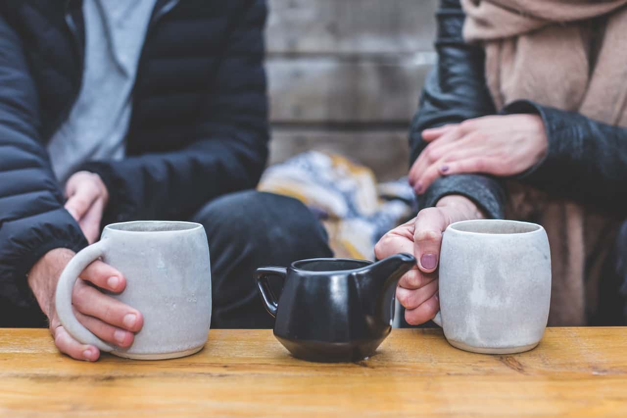 man-and-woman-having-a-tea-conversation-373970