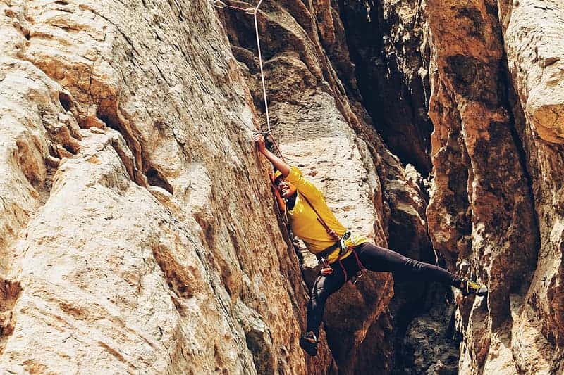 man-climbing-on-cliff