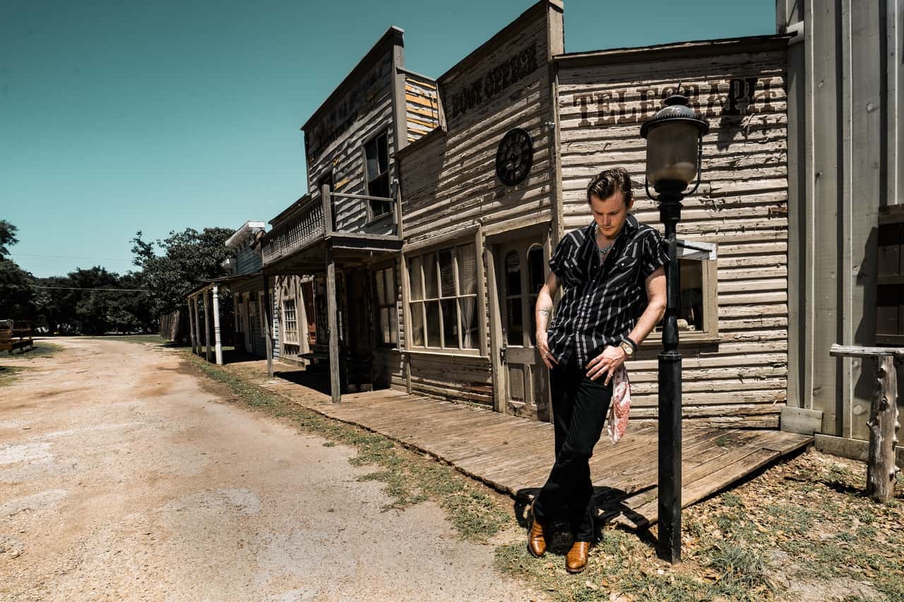 man-wearing-blue-stripe-button-up-collared-shirt-2463404