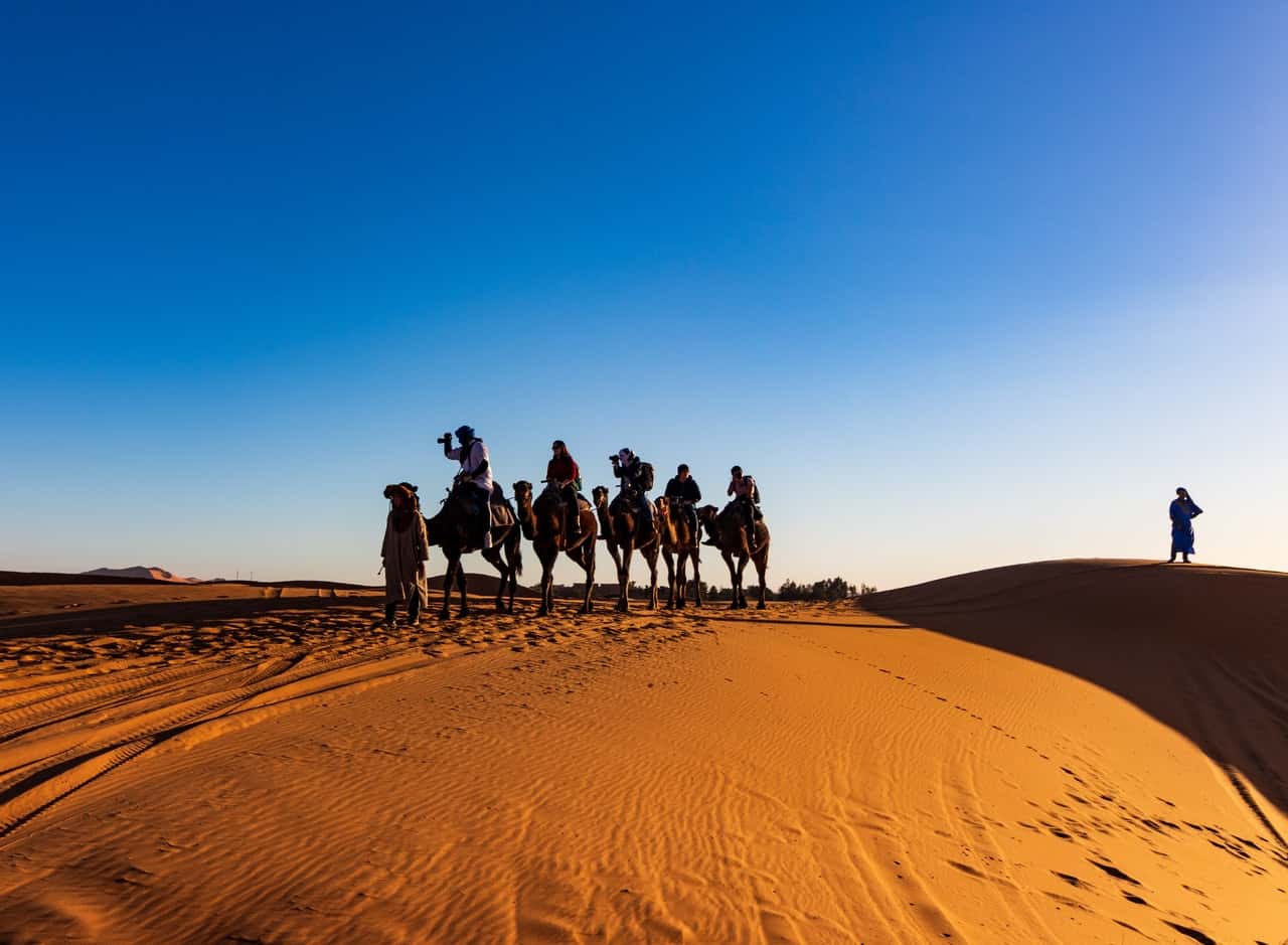 people-riding-on-camels-1703312