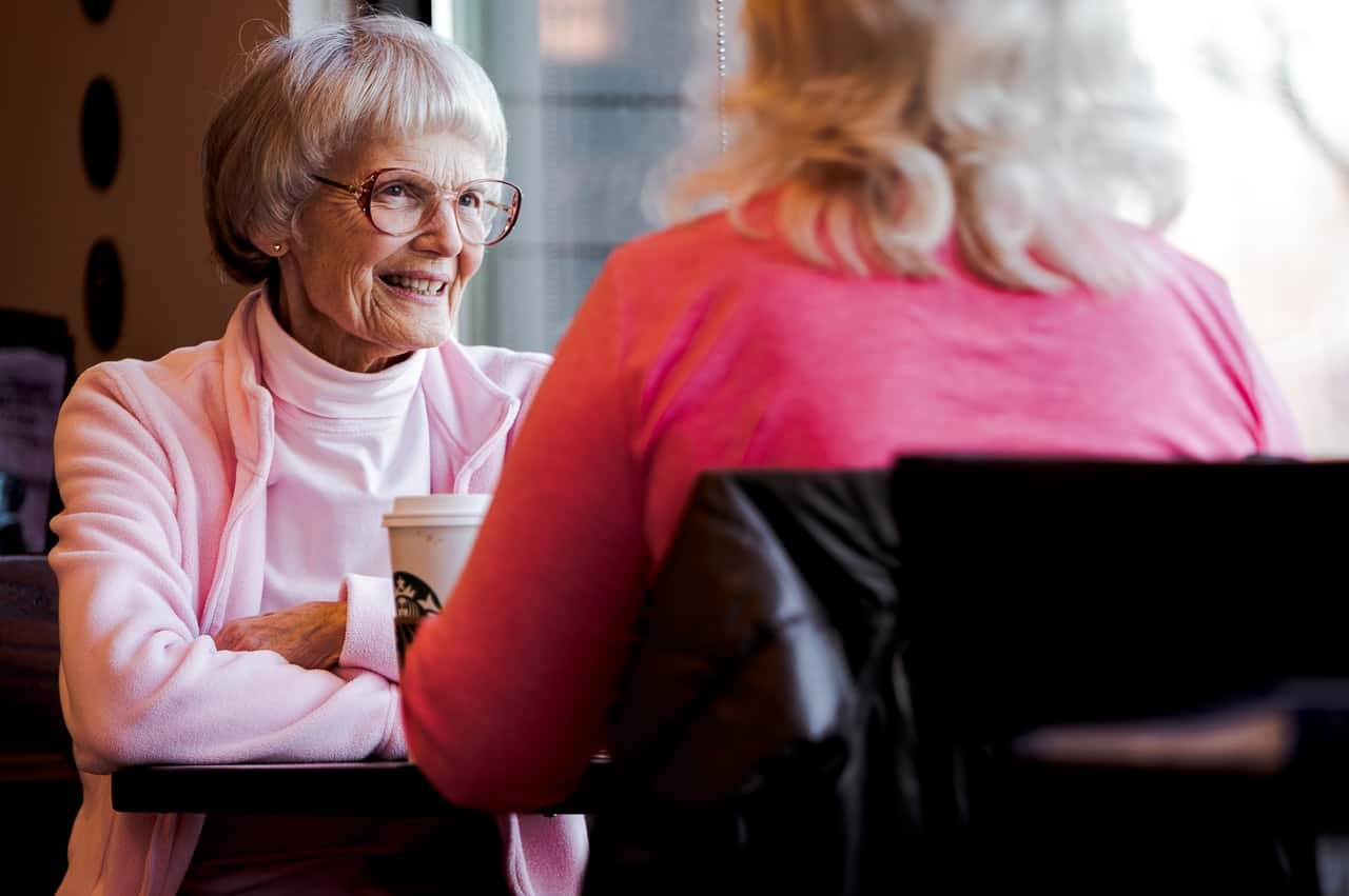 photo-of-old-woman-sitting-while-talking-with-another-woman-3729182