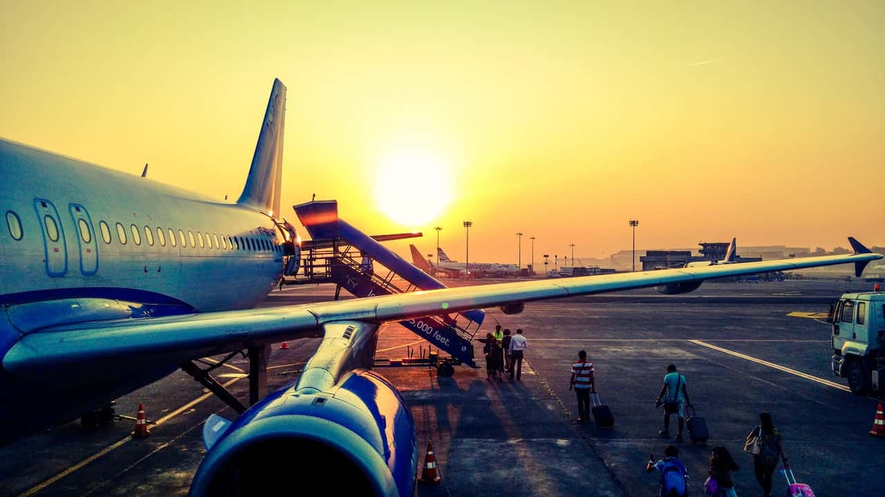 photography-of-airplane-during-sunrise-723240