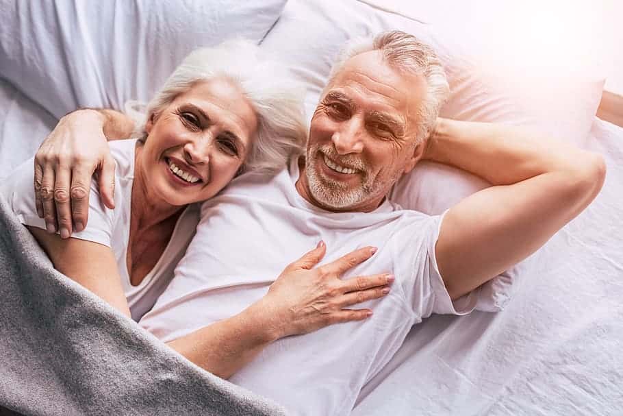 senior-couple-couple-in-bed-couple-holding-couple-smiling-smiling-happy