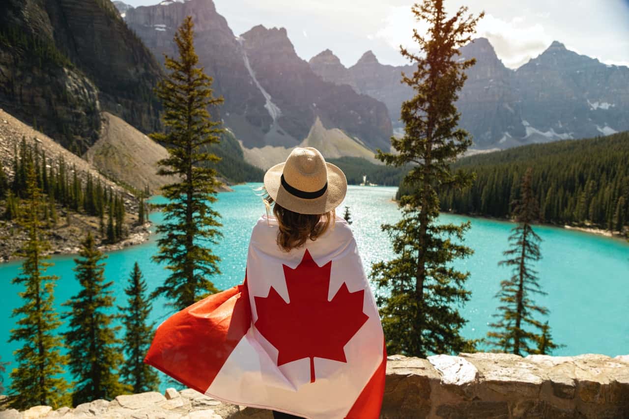 woman-draped-in-a-flag-of-canada-2916826