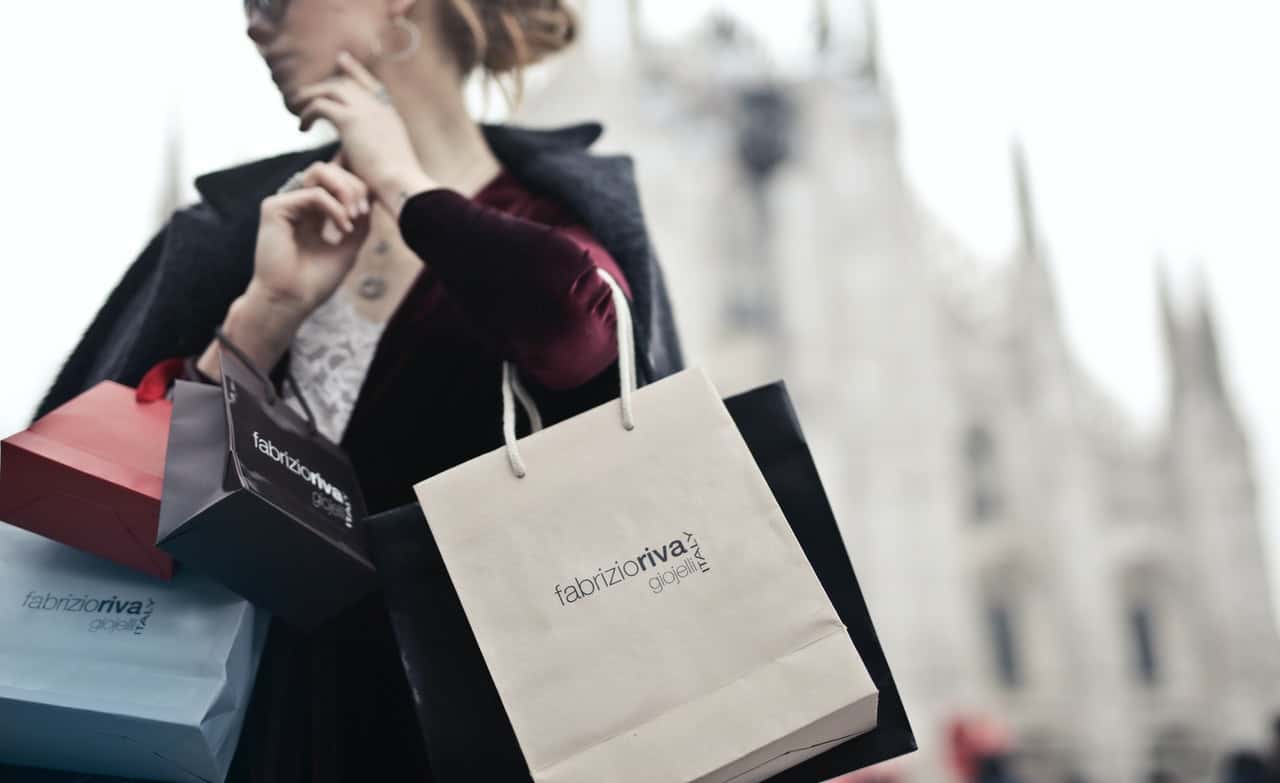 woman-holding-shopping-bags-972887
