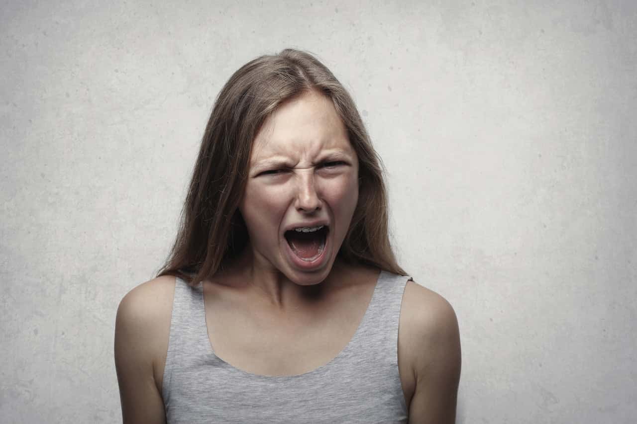 woman-in-gray-tank-top-shouting-3812761