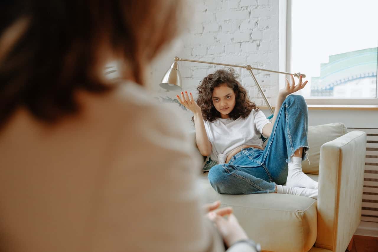 woman-listening-to-therapist-3958415