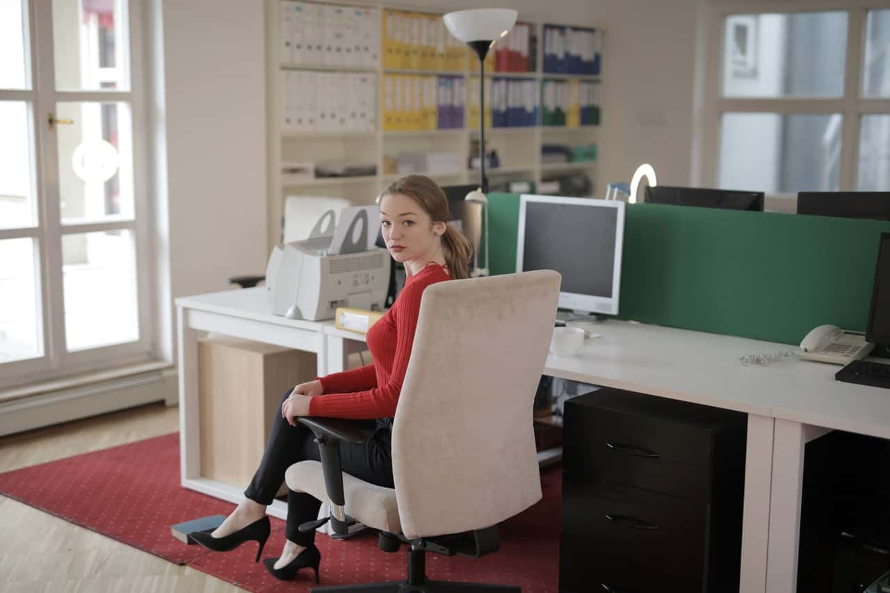 woman-sitting-in-office-chair-3791147