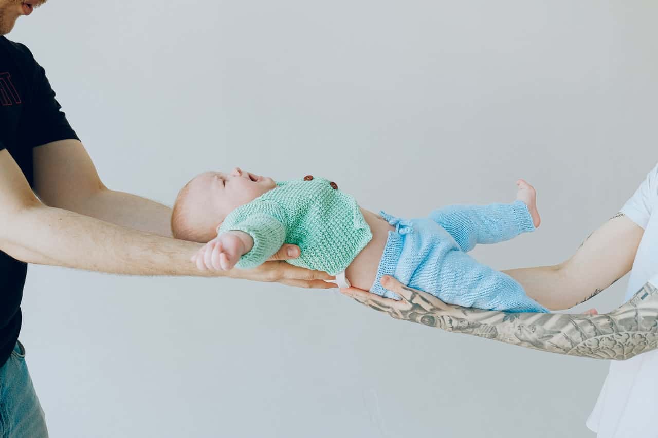 baby-in-green-knitwear-3845446