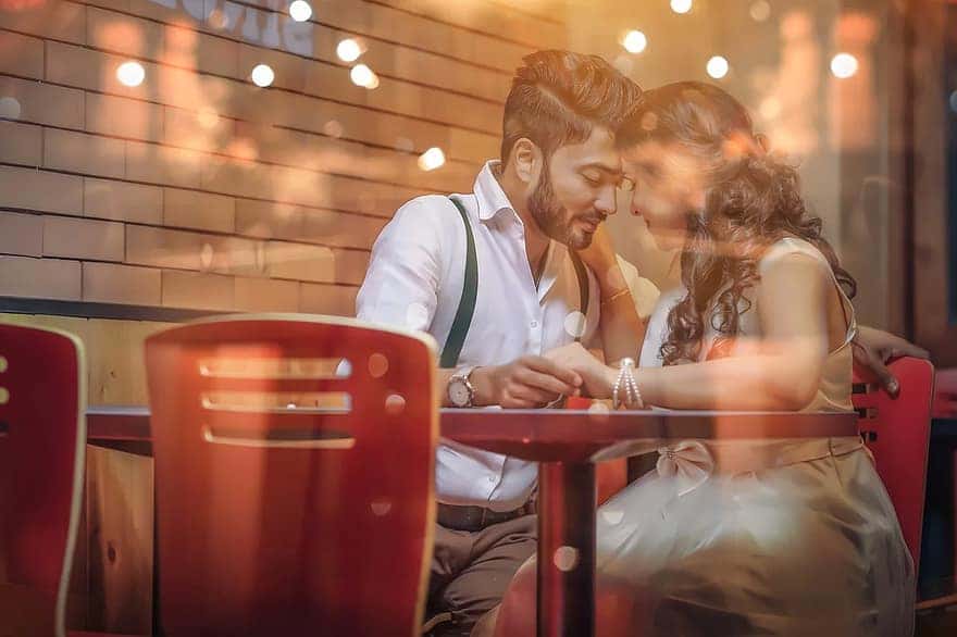 christmas-dinner-couple-dining-party-red-drink-glass-celebration-christmas