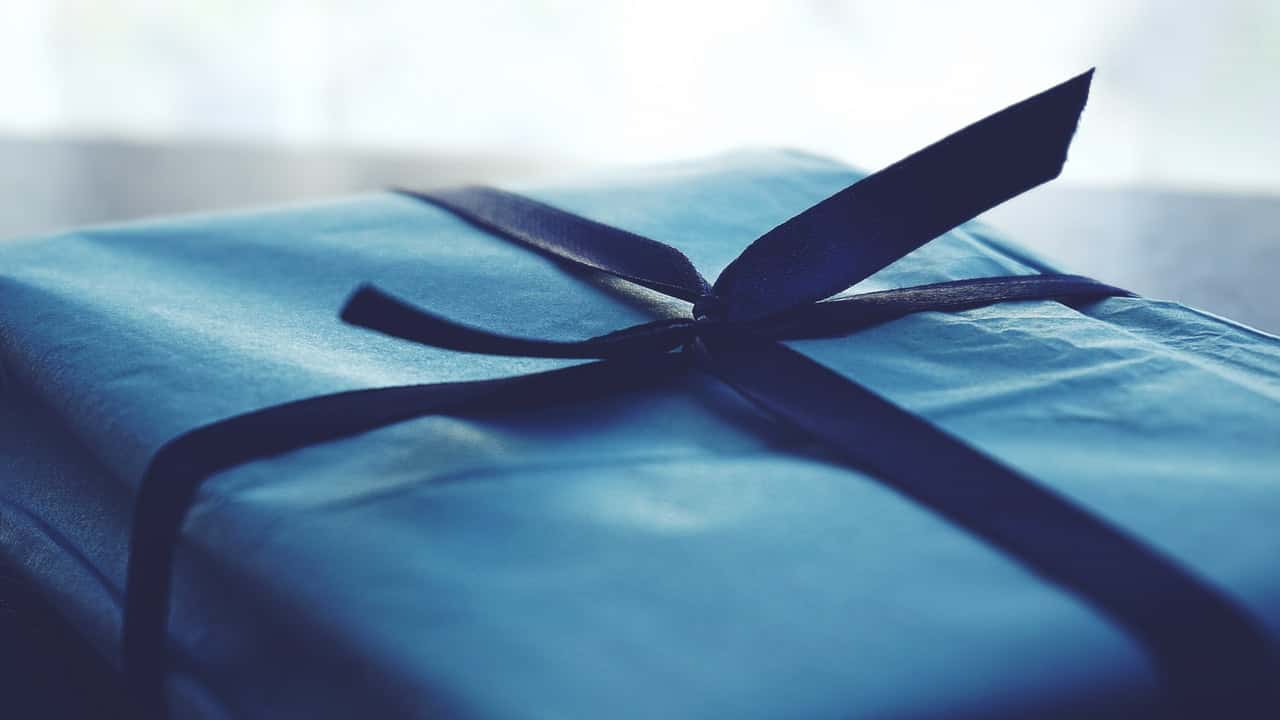 close-up-photo-of-tied-blue-box-1178562