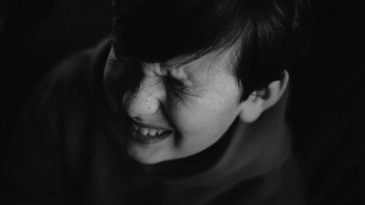 grayscale-photo-of-boy-3142299