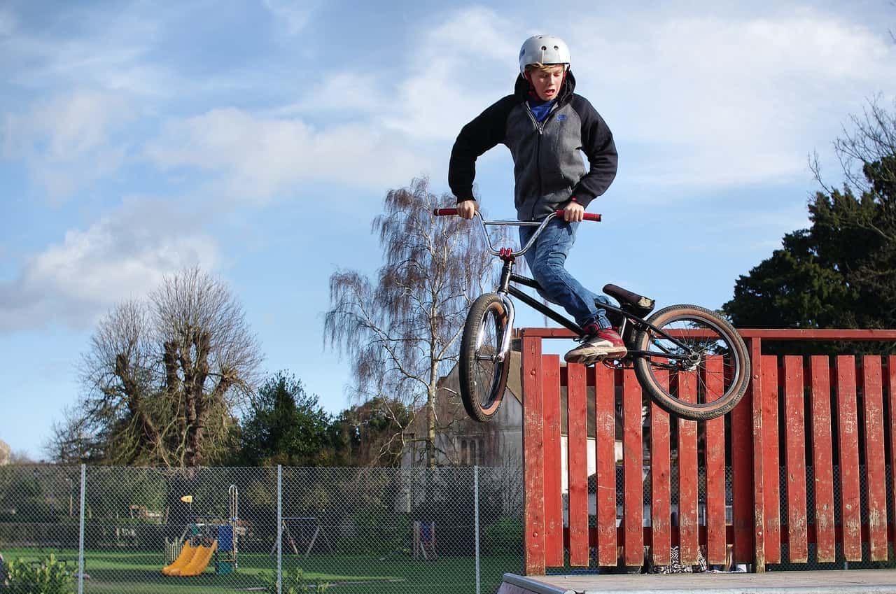 man-doing-tricks-on-his-black-bmx-1379533