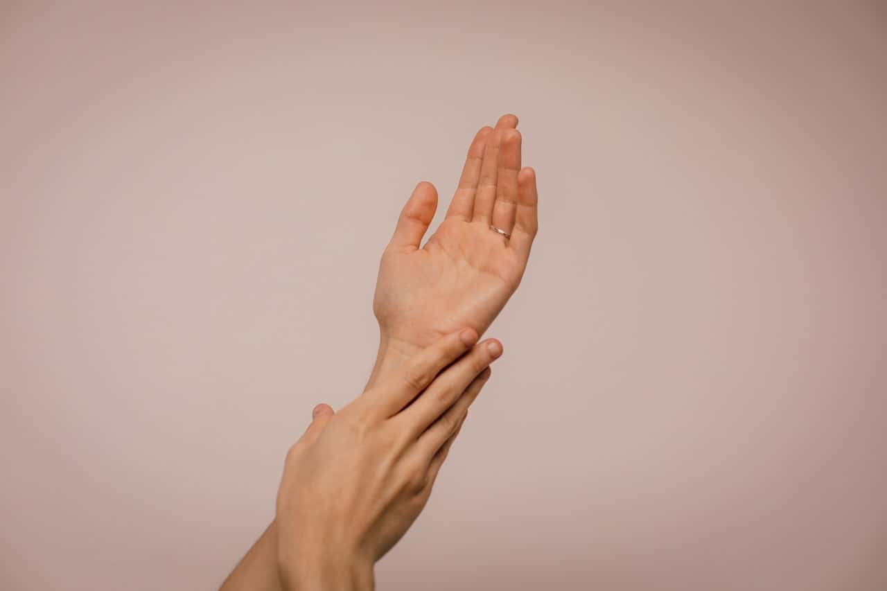 person-touching-hand-1242349