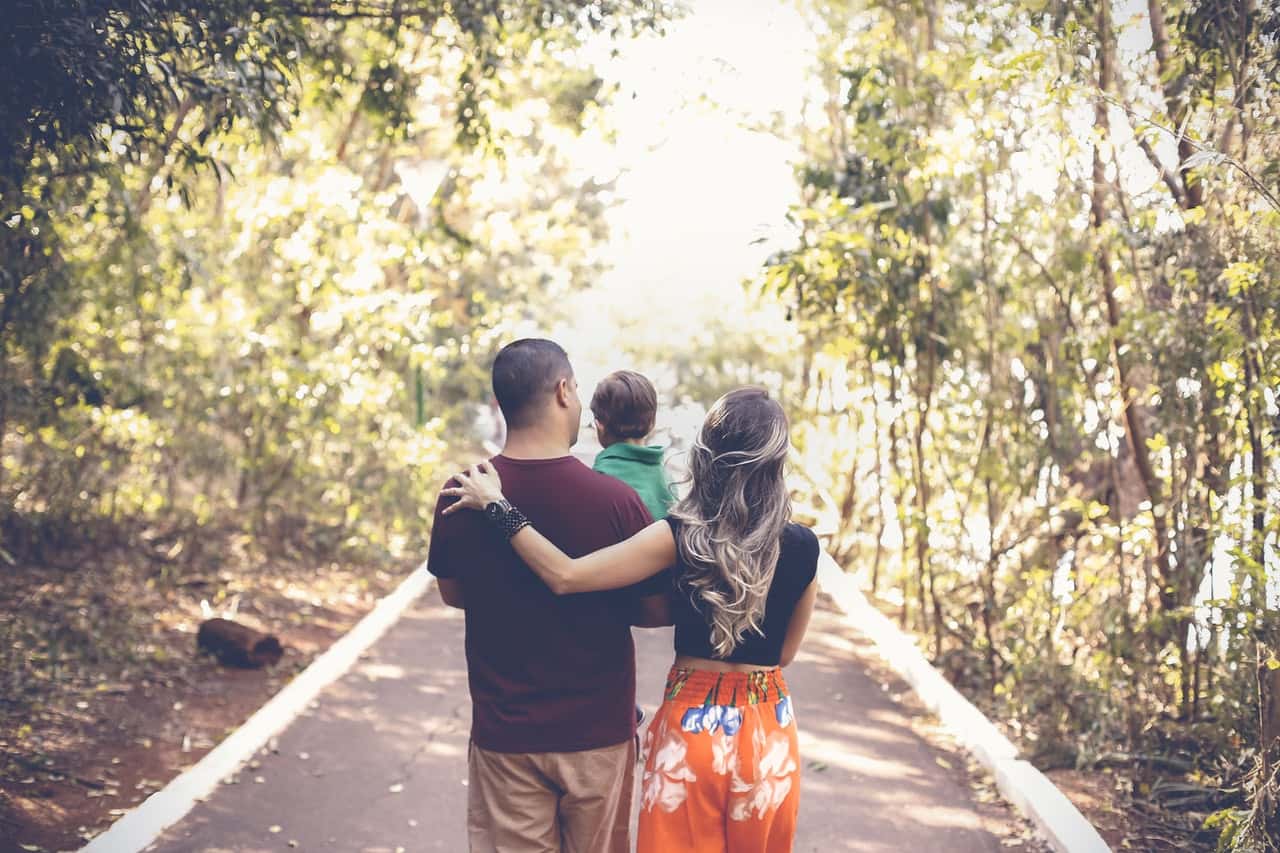 photo-of-family-walking-on-park-2880897