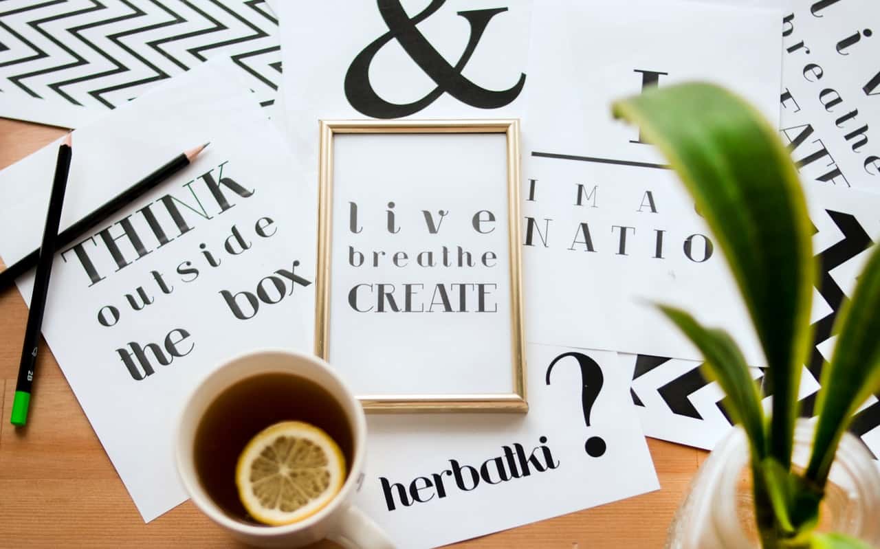 quote-calligraphy-under-cup-of-lemon-tea-688668