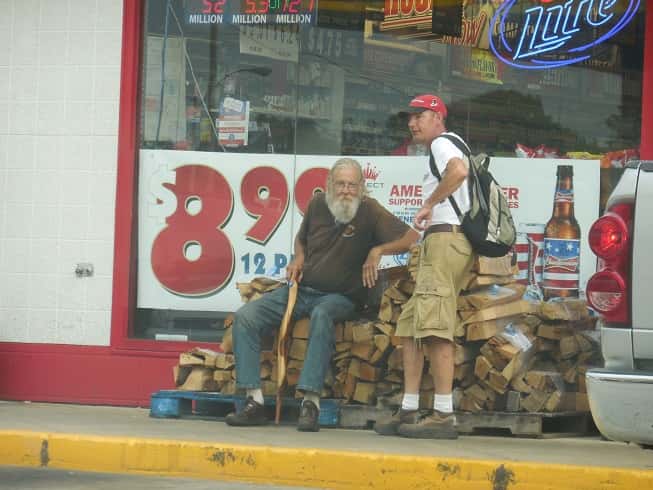 Old_Men_Talking_Outside_a_Gas_Station