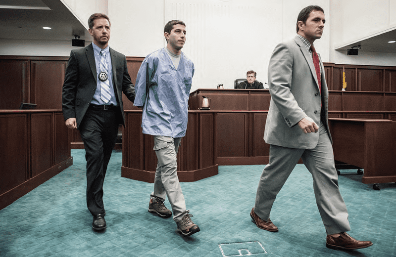 US_Marshals_escorting_prisoner_in_court
