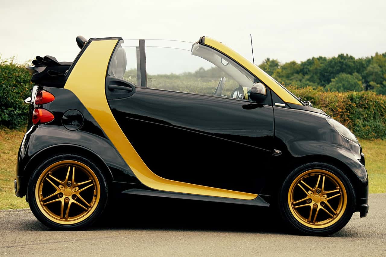 black-and-yellow-smart-car-on-focus-photography-2937410