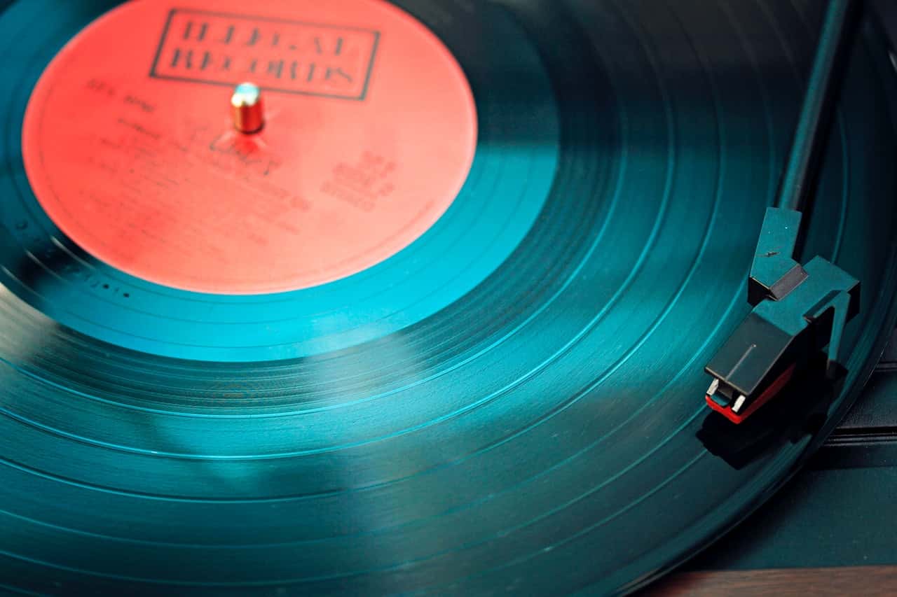 black-vinyl-record-playing-on-turntable-1389429