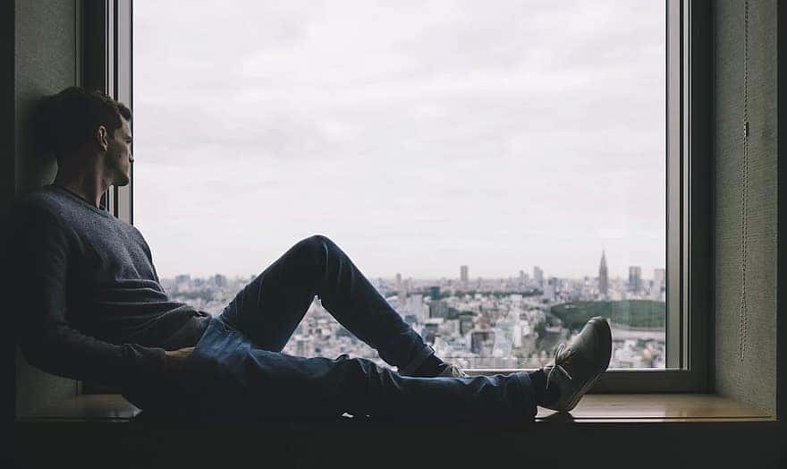 city-man-person-solo-window-alone-thinking-relax