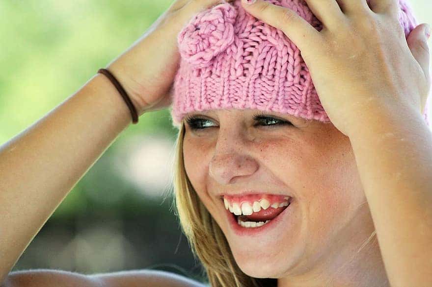 girl-hat-happy-laughing-face-cute-smiling-close-up-child