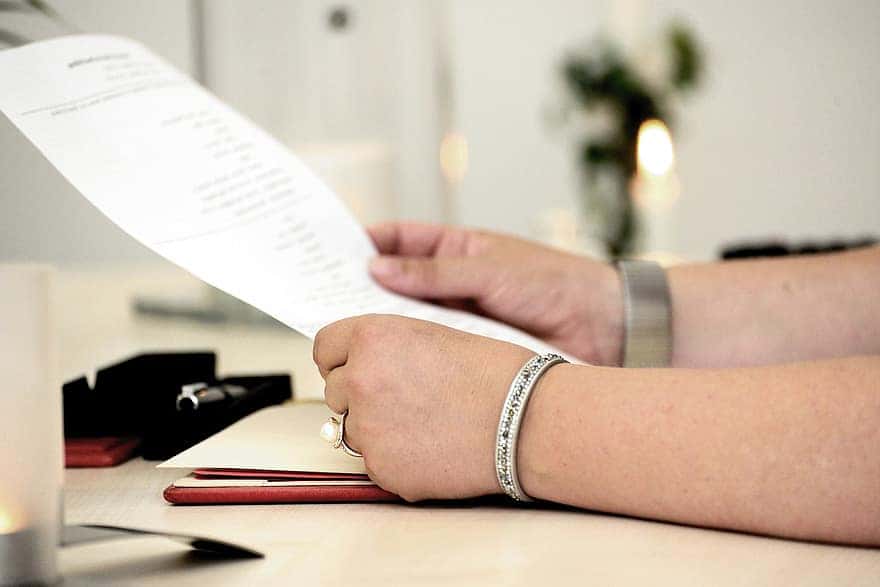 hands-read-document-read-out-registry-office-official-contract-leaf-desk