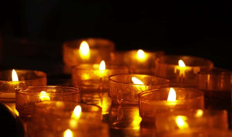 lighted-candles-in-the-dark