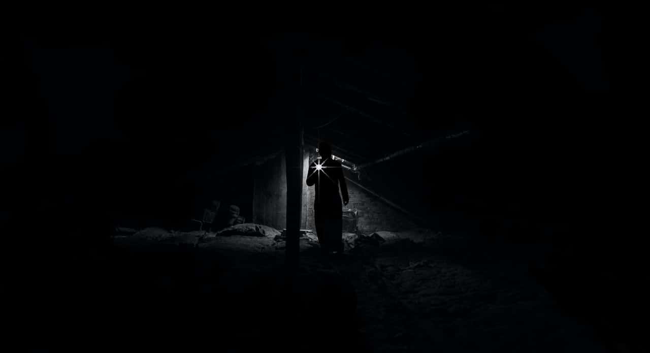 low-angle-view-of-man-standing-at-night-316681