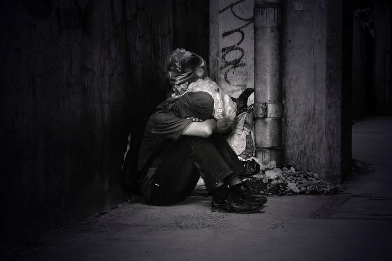 monochrome-photo-of-a-homeless-man-758794